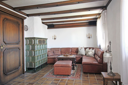 Wohnbereich mit Kachelofen - 