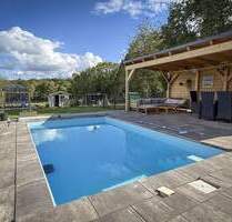 Außergewöhnliches Zweifamilienhaus mit Poollandschaft in Waldrandnähe sucht neue Eigentümer - Saarbrücken / Klarenthal