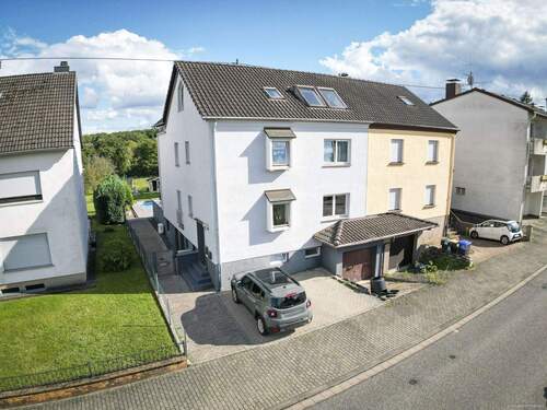 Front - Mehrfamilienhaus, Wohnhaus zum Kaufen in Saarbrücken / Klarenthal