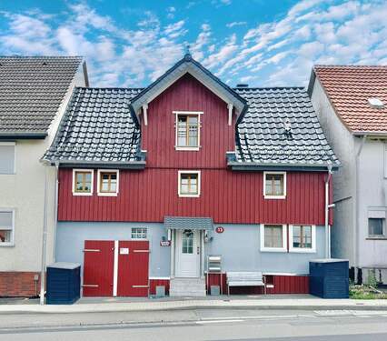 Ansicht (1) - 7 Zimmer Doppelhaushälfte zum Kaufen in Calden