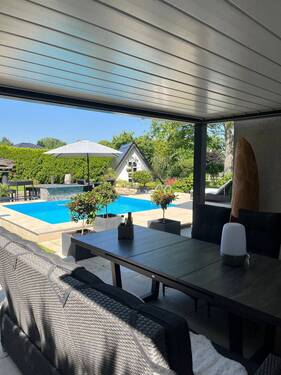 Überdachte Terrasse.jpeg - Einfamilienhaus mit 119,00 m² in Leipzig zum Kaufen