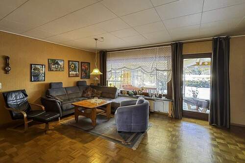 EG - Wohnzimmer - Bungalow mit 108,00 m&sup2; in Lüder zum Kaufen