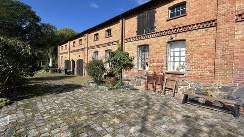 Ansicht mit Terrassen - Mehrfamilienhaus, Wohnhaus mit 213,00 m&sup2; in Hoppenrade zum Kaufen