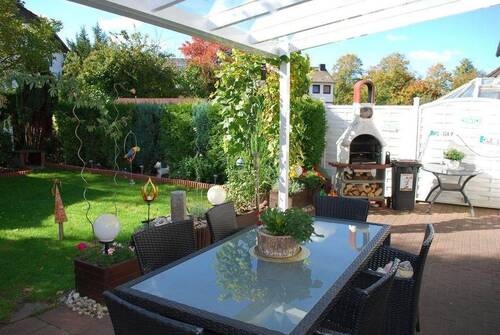 Terrasse mit Kamin - 