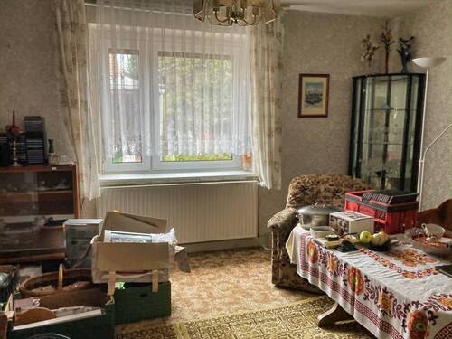 Wohnzimmer - Einfamilienhaus mit 120,00 m&sup2; in Kyffhäuserland zum Kaufen