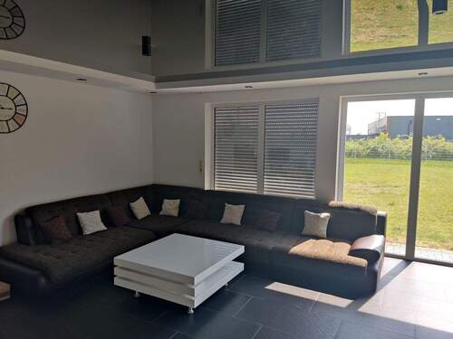 Wohnzimmer Bild 1 - Einfamilienhaus mit 192,00 m² in Euerbach zum Kaufen