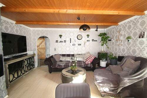 Das Wohnzimmer - Bungalow mit 82,00 m² in Heist zum Kaufen