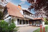 Ansicht mit Wintergarten - 6 Zimmer Einfamilienhaus zum Kaufen in Dinklage