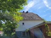 Seitenansicht mit Garage - 