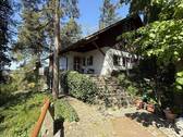 Bild 1 - Wohnhaus in idyllischer Lage mit Carport und zwei Schuppen
