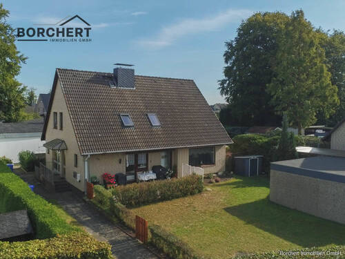 Bild 1 - Heizung bereits modernisiert - vermietetes Zweifamilienhaus zu verkaufen