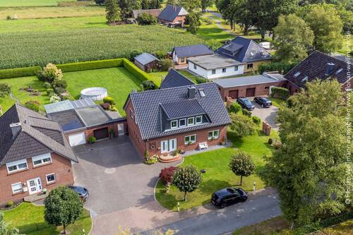 Bild 2 - 7 Zimmer Einfamilienhaus zum Kaufen in Vollersode