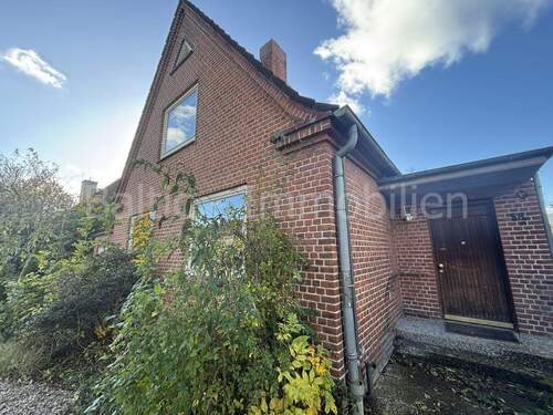 Ansicht vorne - 4 Zimmer Einfamilienhaus zum Kaufen in Neustadt in Holstein