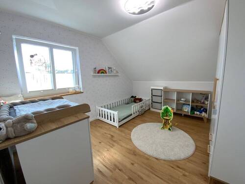 Schlafzimmer im Dachgeschoss - 