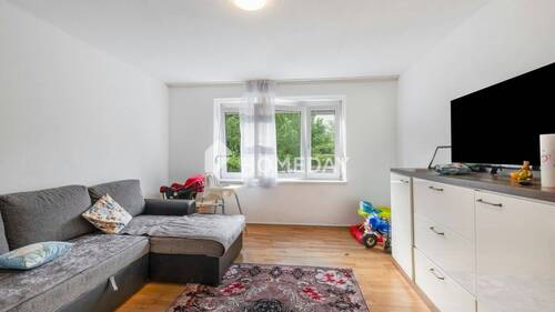 Wohnzimmer 1 - 2-Zimmer-Wohnung mit Terrasse und Gartenteil - ca. 55 Quadratmeter Wohnfläche