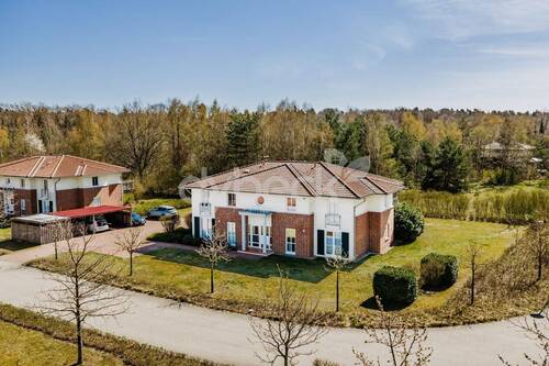 Hausansicht - Vollvermietetes Investment mit Entwicklungspotenzial am Golfplatz von Adendorf