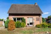 Vorderansicht - 5 Zimmer Einfamilienhaus zum Kaufen in Nordhorn