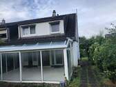 Rückansicht mit Wintergarten - 3 Zimmer Doppelhaushälfte zum Kaufen in Merchweiler