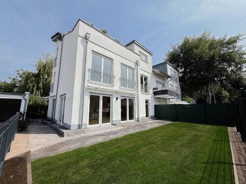 Impression Außenansicht - Exklusives Wohngefühl in urbaner Gartenwohnung im Haus-im-Haus-Stil!