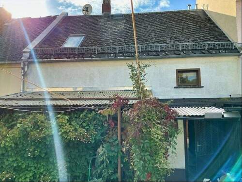 Rückansicht - Reihenmittelhaus mit 69,00 m&sup2; in Oelsnitz zum Kaufen