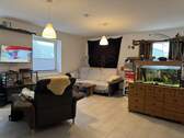 großzügiges Wohnzimmer - 3 Zimmer Etagenwohnung in Süderhastedt