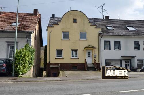 Front 1 - Attraktives Einfamilienhaus mit durchdachter Raumaufteilung und liebevoll gepflegtem Garten