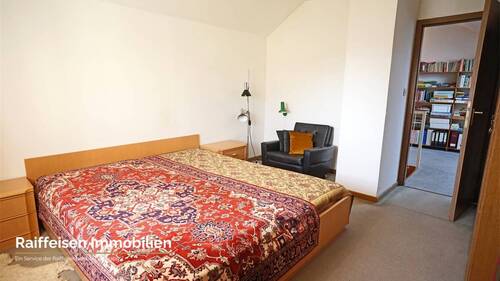 RAIBA IMMO - Wohnen am Sonnenhang 1 - Schlafzimmer Ost - 
