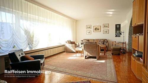 RAIBA IMMO - Wohnen am Sonnenhang 1 - Wohnzimmer - 