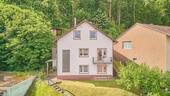 Außenansicht - Einfamilienhaus mit Potential auf großem Grundstück in Waldrandlage!