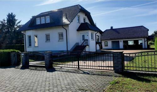 Ansicht - Traumhaftes Einfamilienhaus mit Vollkeller und großzügiger Garage Werkstatt