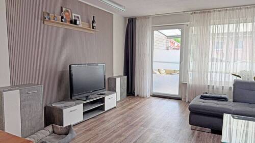 Wohnzimmer - Reihenmittelhaus mit 98,00 m&sup2; in Voerde zum Kaufen