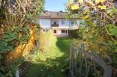 Rückfassade, Garten - Reihenmittelhaus mit 102,00 m&sup2; in München zum Kaufen