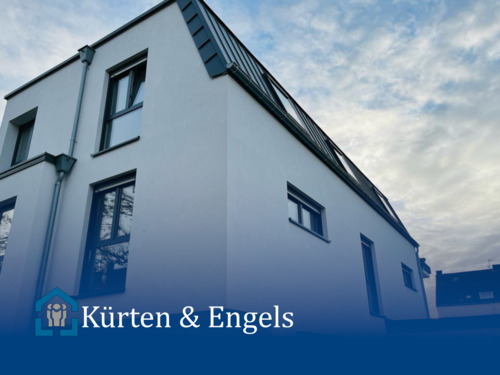 Ansicht vorne - Moderne 3-Zimmer Wohnung mit Terrasse und Gartenanteil