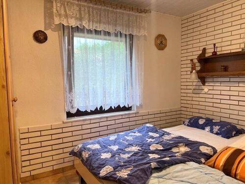 Schlafzimmer - Mehrfamilienhaus, Wohnhaus mit 32,00 m&sup2; in Lohmen zum Kaufen