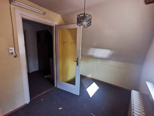 Zimmer im Dachgeschoss - 