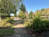 Blick zur Zufahrt Gartenteil - 