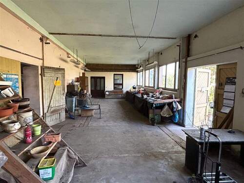 Werkstatt mit Blick zum Büro und Ausgang Gartentei - 