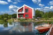 Ansicht Garten Trespa - EIN­FA­MI­LI­EN­HAUS MIT MODERNEM DE­SI­GNAN­SPRUCH