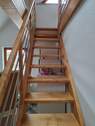 Holztreppe vom OG in das ausgebaute DG - 