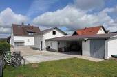 Außenansicht neu - Attraktives Wohnpaket: Saniertes Zweifamilienhaus + Nebengebäude als eigene Einheit in Staffelbach