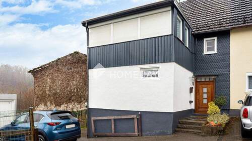 Außenansicht 4 - Charmante DHH mit Wintergarten, fünf Zimmern und viel Gestaltungsspielraum in ruhiger Lage