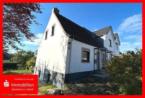 Bild 1 - Charmantes Reihenendhaus mit großem Grundstück und Entwicklungspotenzial