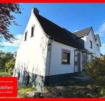 Charmantes Reihenendhaus mit großem Grundstück und Entwicklungspotenzial - Lübeck Schlutup