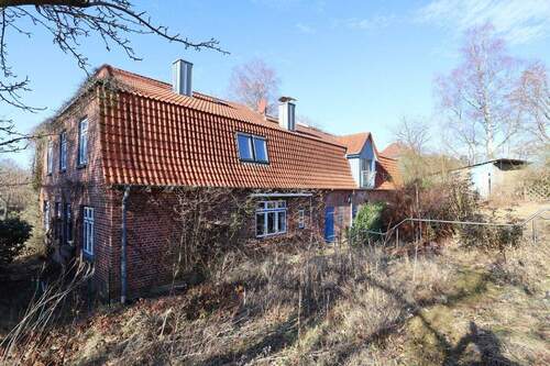 Front links - Einfamilienhaus mit 385,00 m&sup2; in Rickling zum Kaufen