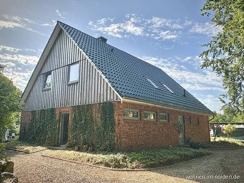 Hausansicht seitlich vorne - 6 Zimmer Einfamilienhaus zum Kaufen in Osdorf