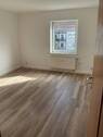 Wohnzimmer - Praktisch, gemütlich, bezahlbar: 2-Zimmer-Wohnung für alle Lebenslagen