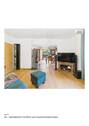 07_EG_-_Wohnbereich_mit_Blick_zum_Esszimmer-Kaminofen - 
