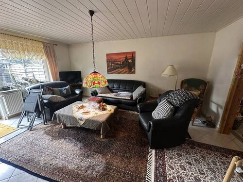 Wohnzimmer - Reihenmittelhaus mit 110,00 m&sup2; in Ostrhauderfehn zum Kaufen