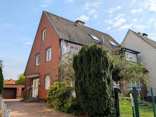 Bild 1 - Solides und gepflegtes Zweifamilienhaus mit ausgebautem Dachgeschoss in Hasbergen
