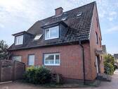 Bild 3 - 7 Zimmer Mehrfamilienhaus, Wohnhaus in Hasbergen